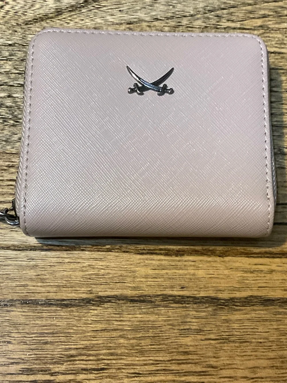 Sansibar Zip Wallet, signature crossed saber metal logo on front, rose/taupe